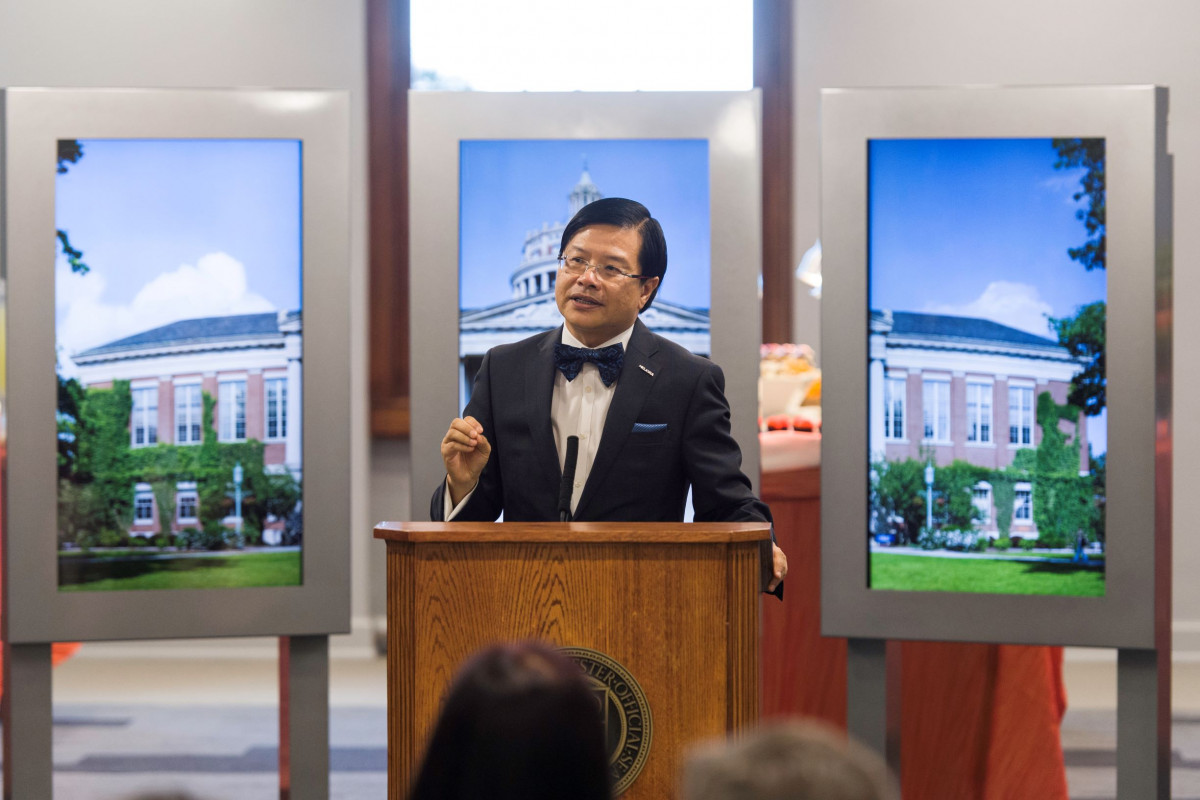 Evans Lam at a podium