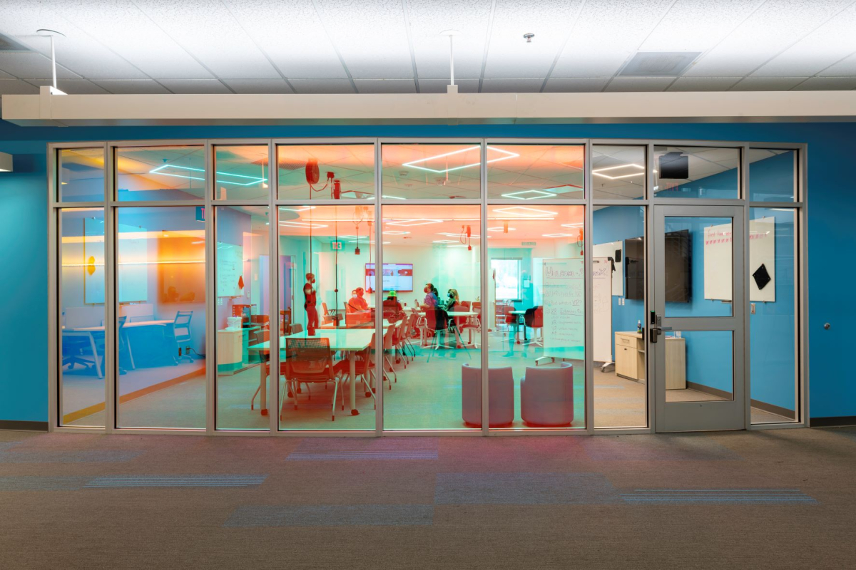 The entrance of Studio X, featuring its chromatic glass wall