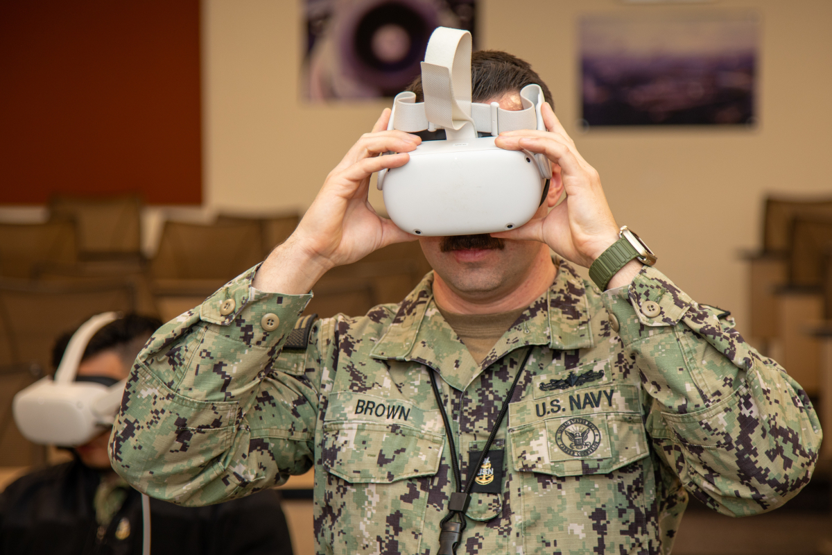 soldier tries a vr headset. 