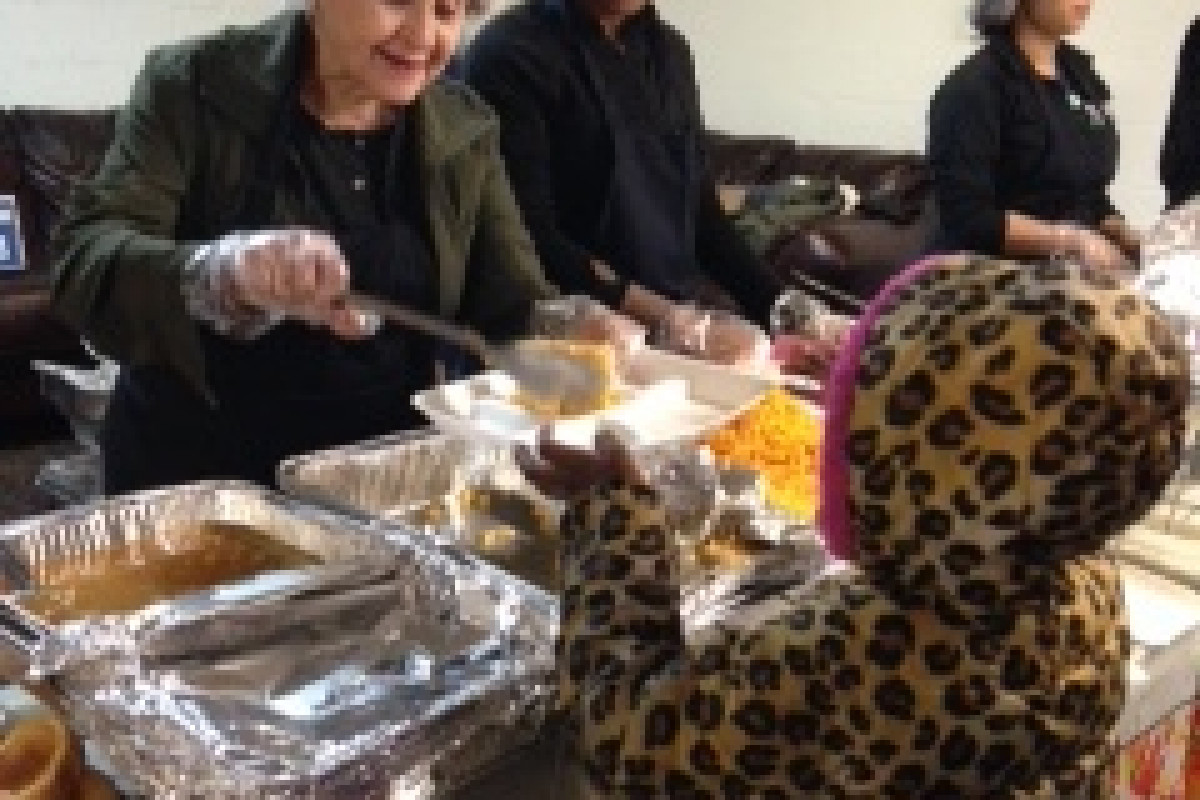 Congresswoman Louise Slaughter serving food 