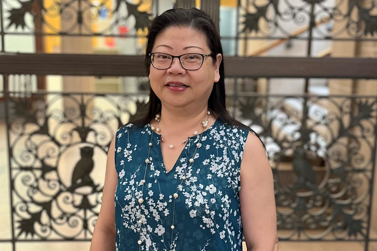 Kathy Wu standing in Friedlander lobby