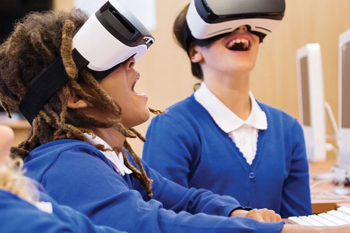 children wearing vr headsets.