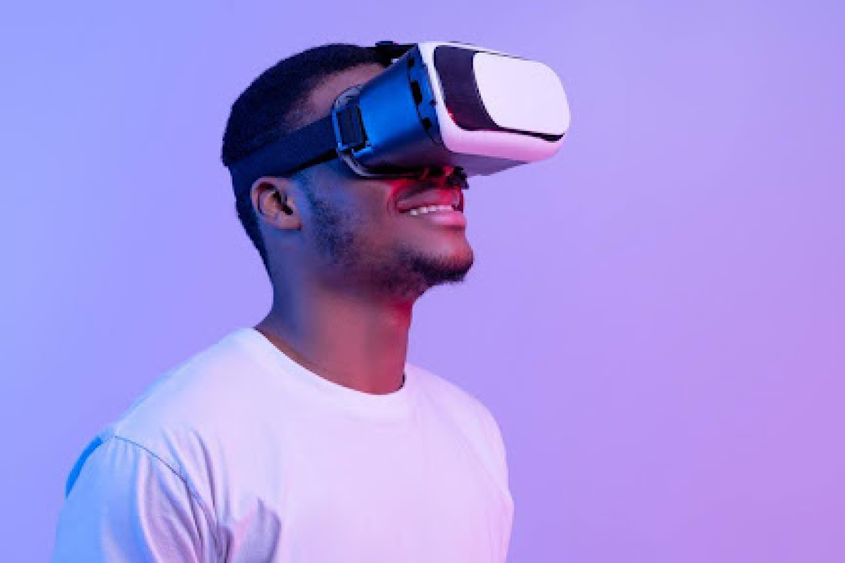 Person looking into a virtual reality headset. 