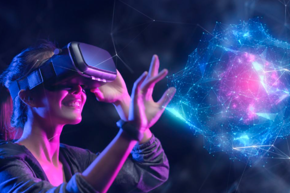 A woman in a VR headset interacts with a glowing digital sphere.