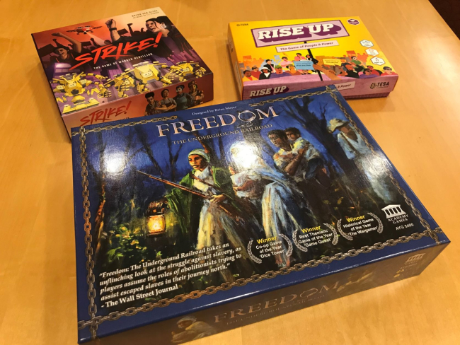 A collection of board games on a table