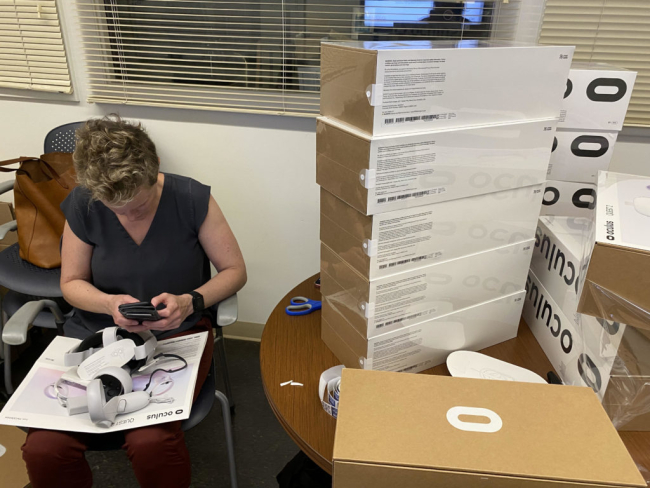 Unboxing Meta Quest virtual reality headsets.