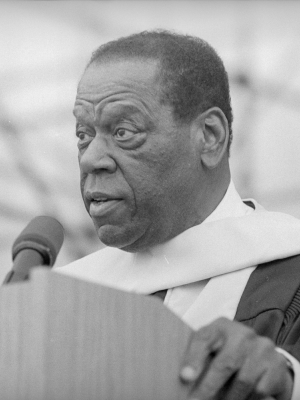 William Warfield speaking at Commencement podium