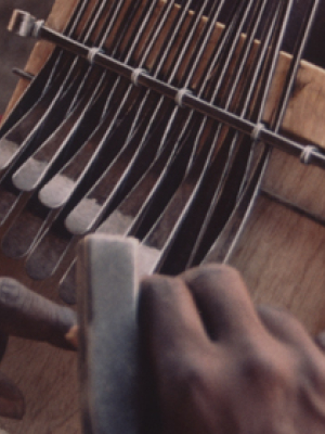 Sekuru Chigamba making mbira
