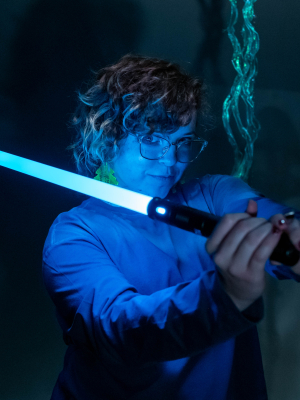 Bug Smiling for camera with light up saber