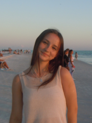 Kathryn smiling at beach